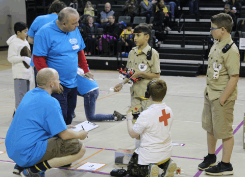 Destination Imagination team members answering Appraisers' questions about their Challenge solution at a tournament